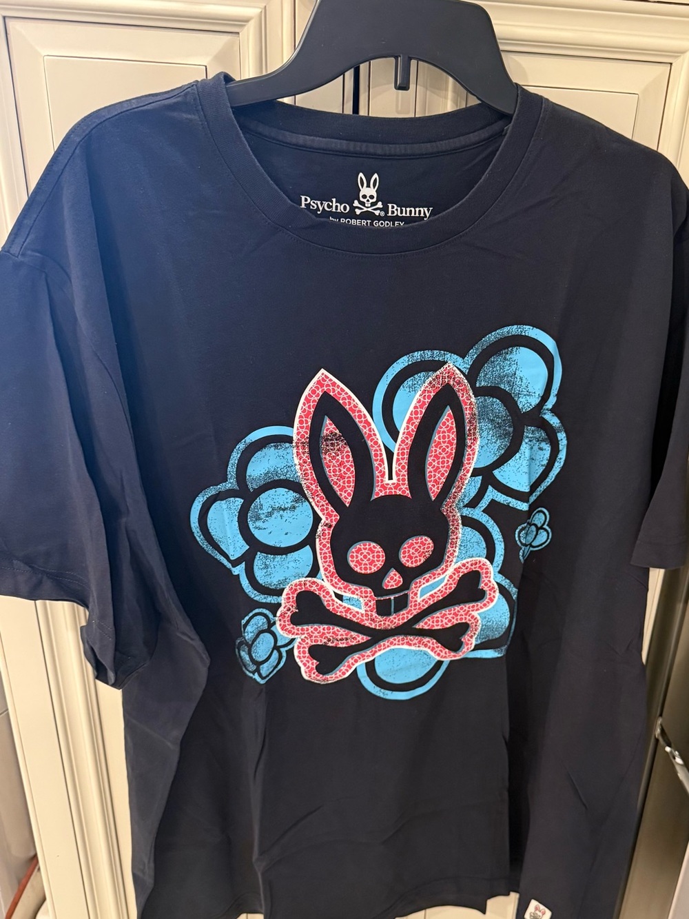 Psycho Bunny Black Tee with Blue Floral and Pink Bunny Graphic